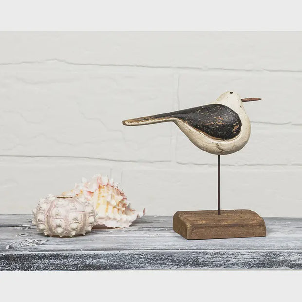 Small Slender Bird On Base