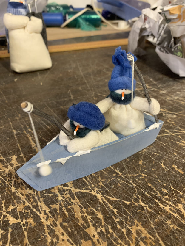 Little Snowfolk In Fishing Boat
