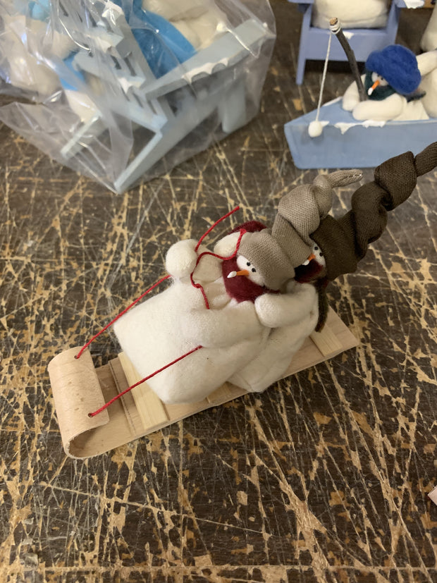 Two Little Snowfolk In Tobogan